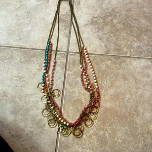 Necklace from Anthropologie, gold chain/loos with beaded accent.